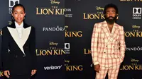 Yara Shahidi dan Donald Glover memakai suit Gucci Fall Winter 2019-2020 di premiere The Lion King (Dok. Gucci)