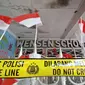 Garis polisi melintang di pagar daycare sekaligus PAUD Wensen School, Jalan Putri Tunggal No. 42, Cimanggis, Depok. Di lokasi ini terjadi kekerasan terhadap anak yang dilakukan oleh pemilik sekolah, Meita Irianty (MI). (Liputan6.com/Dicky Agung Prihanto)