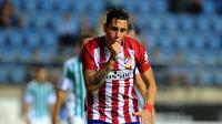 Pemain Atletico Madrid, Jose Maria Gimenez mencetak satu gol saat Atletico Madrid menang telak atas SD Eibar pada lanjutan La Liga Spanyol pekan ke-23. (AFP/Cristina Quicler)