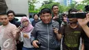 Anggota Komisi II DPR, Sarehwiyono usai menjalani pemeriksaan KPK, Jakarta, Jumat (22/7). KPK terus mengembangkan perkara lain yang diduga turut 'diatur' oleh Panitera PN Jakut, Rohadi. (Liputan6.com/Helmi Afandi)