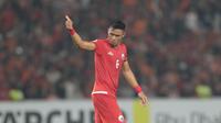 Pemain Persija Jakarta, Maman Abdurahman saat melawan Tampines Rovers pada laga Piala AFC 2018 di Stadion Utama GBK, Senayan, Jakarta (28/2/2018). Persija menang 4-1. (Bola.com/Nick Hanoatubun)