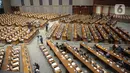 Suasana Rapat DPR RI masa persidangan III tahun sidang 2022-2023 di kompleks parlemen, Senayan, Jakarta, Selasa (10/1/2023). Rapat paripurna perdana pada tahun 2023 ini, dipimpin Wakil Ketua DPR Rachmat Gobel. (Liputan6.com/Faizal Fanani)