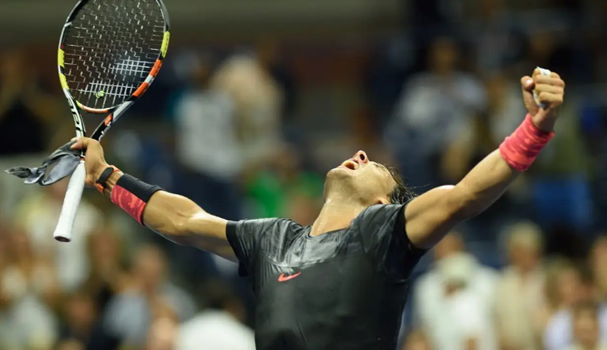 Ekspresi petenis Spanyol, Rafael Nadal, setelah mengalahkan petenis Kroasia, Borna Coric, di babak pertama Turnamen Tenis AS Terbuka 2015 di USTA Billie Jean King National Center, New York, AS. (31/8/2015). (AFP Photo/Don Emmert)
