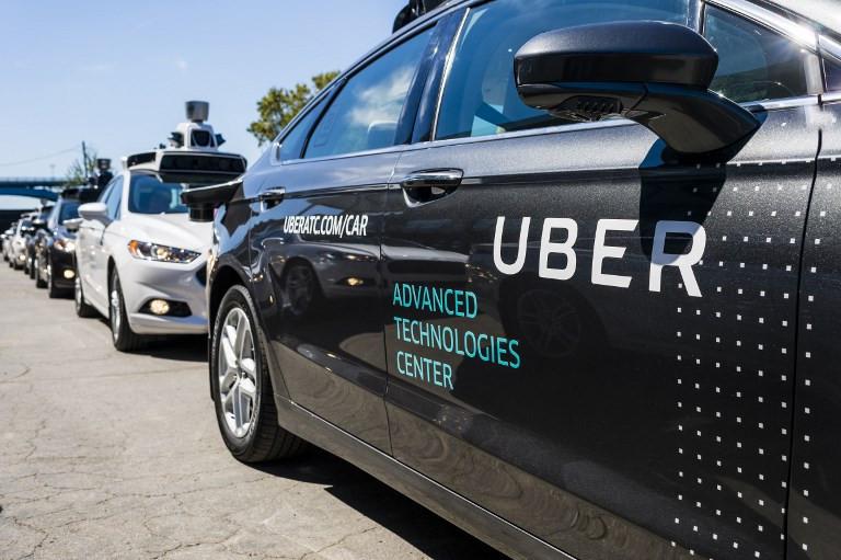Ilustrasi mobil self driving yang dimiliki Uber. Foto diambil pada September 13, 2016,  (ANGELO MERENDINO / AFP)