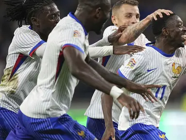 Prancis sukses membungkam Belgia dengan dua gol tanpa balas dalam laga matchday 2 UEFA Nations League 2024/2025 yang digelar di Parc Olympique Lyonnais, Selasa (10/9/2024) dini hari WIB. (AP Photo/Laurent Cipriani)