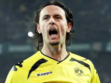 Kegembiraan bek Dortmund Neven Subotic setelah mencetak gol ke gawang Borussia Moenchengladbach, 27 November 2010. AFP PHOTO / FRISO GENTSCH