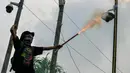 Aksi unjuk rasa ini membawa tuntutan utama, yaitu pencabutan revisi UU TNI serta penolakan terhadap RUU Polri. (BAY ISMOYO/AFP)