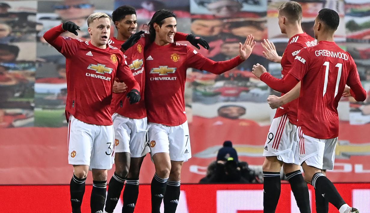 Pertemuan ketiga alias terakhir Manchester United dan Liverpool di Old Trafford pada pada ajang Piala FA terjadi pada putaran keempat musim 2020/2021 (24/1/2021). Hasilnya, MU menang 3-2 lewat gol-gol dari Mason Greenwood (26'), Marcus Rashford (48') dan Bruno Fernandes (78'). Sementara dua gol Liverpool dicetak lewat brace Mohamed Salah (18' dan 58'). (AFP/Pool/Laurence Griffiths)