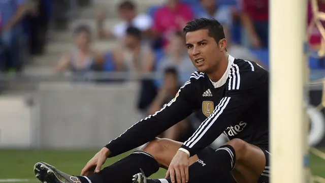 Cristiano Ronaldo ( AFP PHOTO / LLUIS GENE)