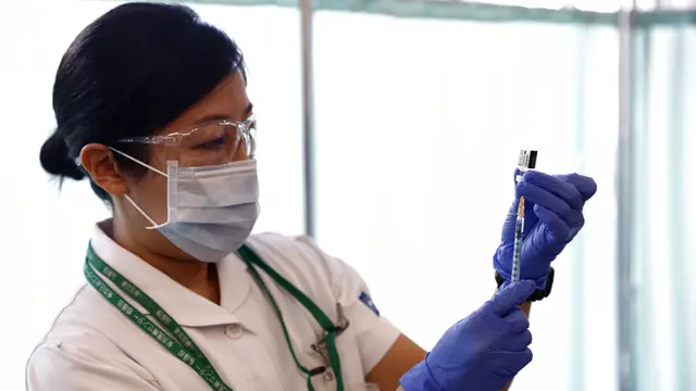 FOTO: Jepang Mulai Vaksinasi Virus Corona COVID-19