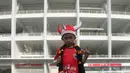Seorang The Jakmania Cilik berpose sebelum menyaksikan laga Persija Jakarta melawan Tampines Rovers pada laga AFC Cup di SUGBK, Jakarta, Rabu (28/2/2018). Persija menang 4-1 atas Tampines Rovers. (Bola.com/Asprilla Dwi Adha)