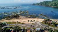 Proyek pengembangan pesisir Mandalika yang diusulkan menjadi lokasi balapan MotoGP di Mandalika, selatan Lombok, 23 Februari 2019. Lokasi MotoGP di Lombok diharapkan dapat menghidupkan kembali ekonomi pulau itu yang sempat dilanda gempa. (ARSYAD ALI/AFP)