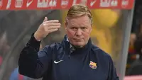 Ronald Koeman memang gagal mengangkat prestasi Barcelona sejak ditunjuk manajemen Barca membesut Blaugrana sejak awal musim 2020/2021. Situasi makin pelik usai Lionel Messi terpaksa hengkang. Sisi positifnya, Koeman sukses memaksimalkan 5 talenta muda yang dipunya. (AFP/APA/Barbara Gindl)