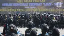 Anggota Korps Brimob Polri mengikuti apel gelar pasukan Operasi Lilin 2023 untuk pengamanan Natal 2023 dan Tahun Baru 2024 (Nataru) di Lapangan Silang Monas, Jakarta Pusat, Kamis (21/12/2023). (merdeka.com/Arie Basuki)
