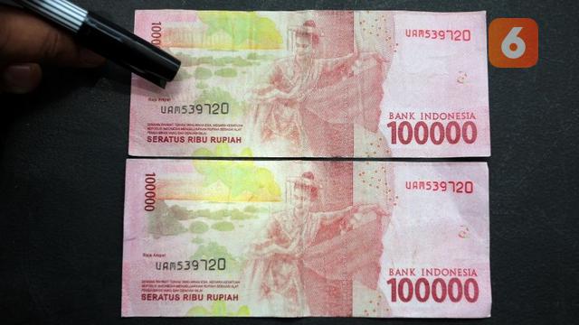Ilustrasi uang Palsu (Arfandi/Liputan6.com)