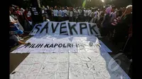 Aksi tersebut mengkampayekan dukungan dan cinta pada KPK serta Polri yang bersih, Jakarta, Minggu (25/1/2015). (Liputan6.com/Faizal Fanani)