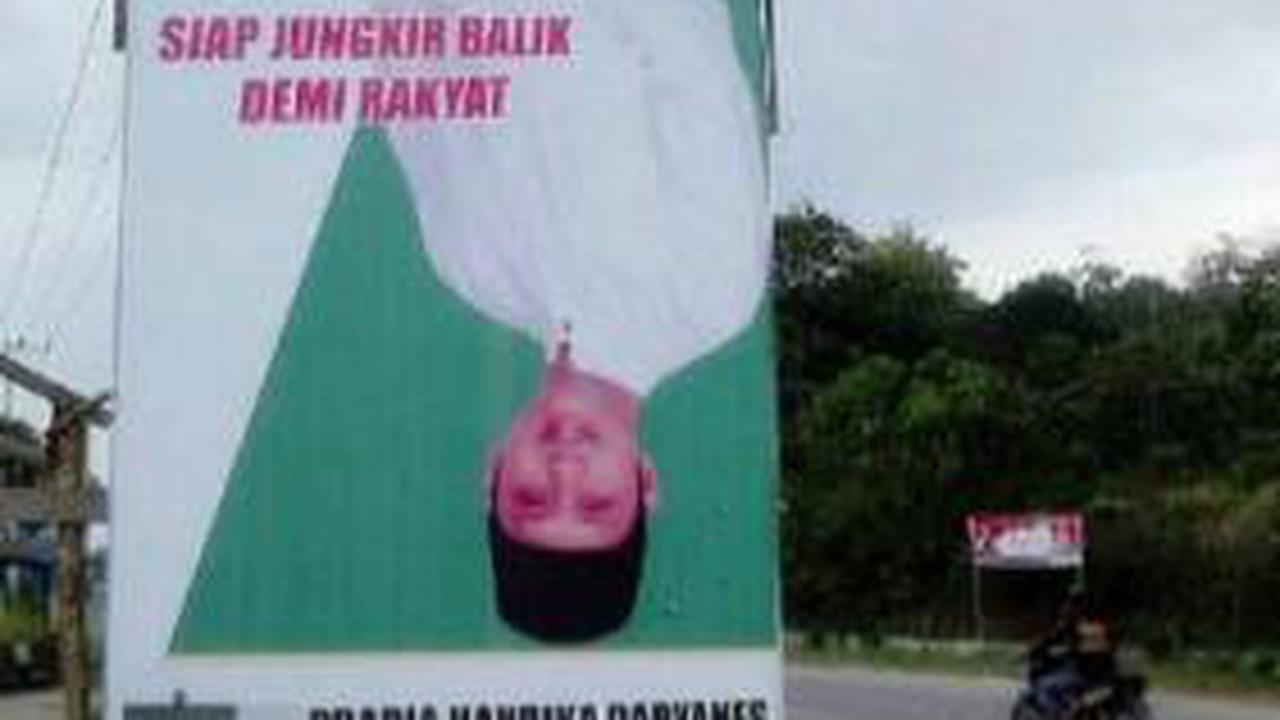 Kampanye Unik, Caleg Pasang Baliho Jungkir Balik