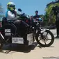 Menggunakan sepeda motor modifikasi, Sri Lestari menuntaskan 1000 kilometer lebih selama 23 jam. 