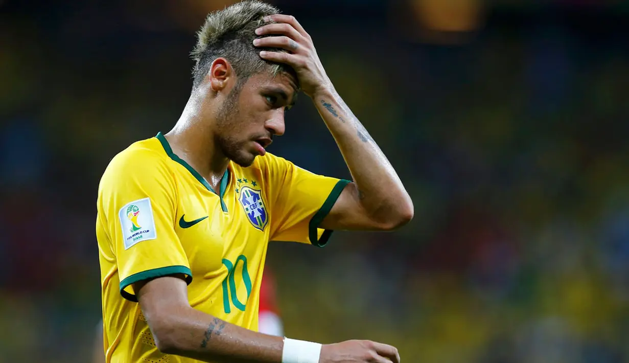 Ekspresi penyerang Brasil, Neymar, usai ditahan imbang Meksiko di penyisihan Piala Dunia 2014 Grup A, Estadio Castelao, Brasil, (18/6/2014). (REUTERS/Marcelo Del Pozo)