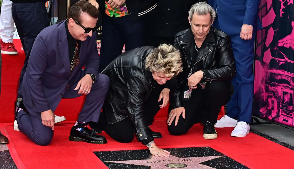 Green Day menjadi yang ke-2810 dari deretan nama yang berjejer di kawasan trotoar Hollywood Boulevard. (Frederic J. Brown/AFP)