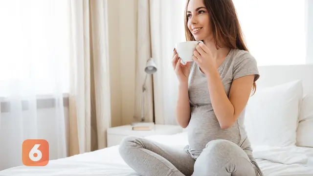Ilustrasi Ibu Hamil Minum Kopi (iStockphoto)