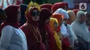 Warga RW 04 Kebun Melati mengikuti upacara Hari Ulang Tahun ke-77 Republik Indonesia di Jakarta, Rabu (17/8/2022). Peringatan Hari Ulang Tahun Republik Indonesia telah menjadi tradisi di kampung tersebut sejak tahun 1975. (merdeka.com/Imam Buhori)