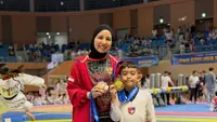Tya Ariestya Dampingi Anak Kejuaraan Taekwondo di Korea, Kalundra Borong 2 Medali
