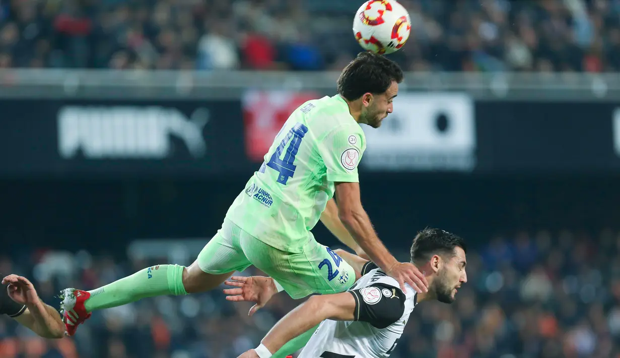 Barcelona menyambangi Valencia di Mestalla dalam duel perempat final Copa del Rey 2024/2025. Skuad asuhan Hansi Flick menang dengan skor telak 5-0. (AP Photo/Alberto Saiz)
