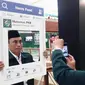 Peserta Mukernas PKB dengan aksi foto selfie. (Liputan6.com/Faizal Fanani)