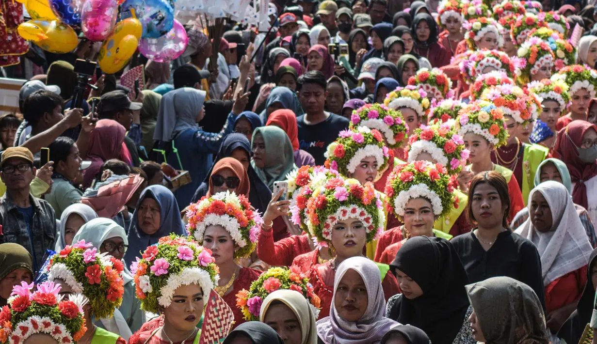 Tujuan festival Ngarot untuk melestarikan tradisi adat peninggalan leluhurnya. (Timur MATAHARI/AFP)