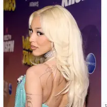Doja Cat Pamer Implan Payudara Tidak Simetris, Jadi Korban Gagal Oplas.&nbsp; (Phillip Faraone / GETTY IMAGES NORTH AMERICA / Getty Images via AFP)