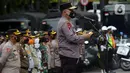 Kapolda Metro Jaya Irjen Pol Fadil Imran menyampaikan pidato pada Apel Gelar Pasukan Operasi Zebra Jaya 2021 di Polda Metro Jaya, Jakarta, Senin (15/11/2021). Operasi Zebra Jaya 2021 digelar karena meningkatnya volume lalu lintas dan kemacetan selama PPKM Level 1. (Liputan6.com/Herman Zakharia)