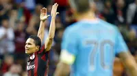 Carlos Bacca celebrates after scoring against Palermo during their Serie A soccer match at the San Siro stadium in Milan, Italy, September 19, 2015. REUTERS/Stefano Rellandini