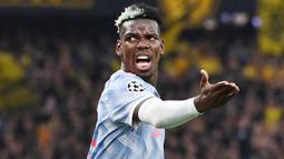 Paul Pogba - Bintang Manchester United ini juga belum menemui titik temu terkait masa baktinya di Old Trafford. Dengan status nasibnya yang belum menentu, mantan bintang Juventus ini bisa saja hengkang secara gratis pada Juli nanti saat kontraknya berakhir. (AFP/Fabrice Coffrini)