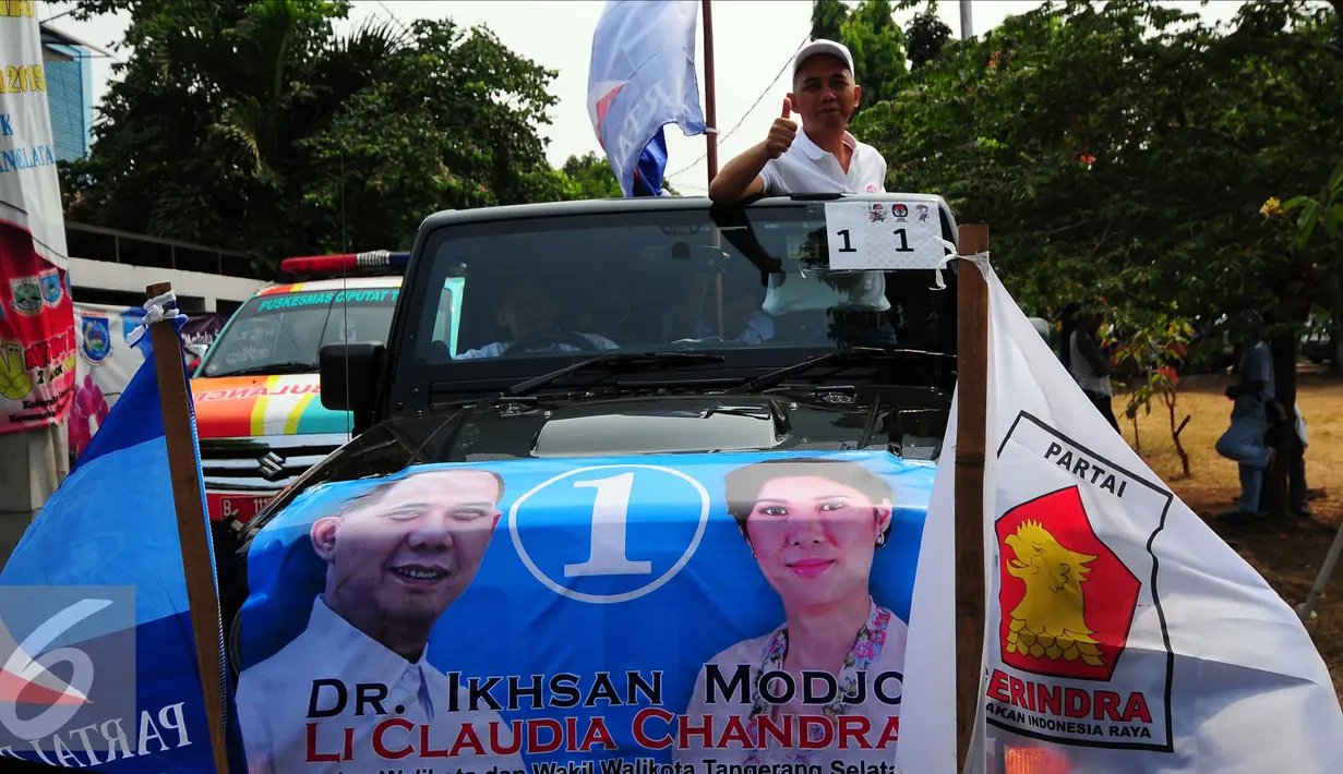 Calon Walikota Tangerang Selatan,  Ikhsan Modjo mengikuti Karnaval Sosialisasi Pilkada Damai Kota Tangerang Selatan, Minggu (20/9/2015) KPUD Kota Tangsel mengajak masyarakat untuk mensukseskan Pilkada Serentak. (Liputan6.com/Helmi Afandi)