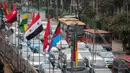 Deretan bendera negara peserta Konferensi Asia Afrika ke-60 terpasang di dinding proyek MRT kawasan Bundaran HI, Jakarta, Selasa (14/4/2015). Persiapan ini dilakukan di sepanjang jalur yang dilalui peserta negara KAA ke-60.  (Liputan6.com/Faizal Fanani)