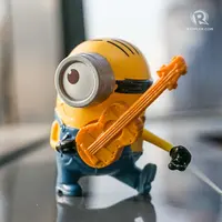 Guitar-strumming Stuart. | via: rappler.com