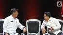 Menteri Pertanian Syahrul Yasin Limpo berbincang dengan Menteri Desa Abdul Halim Iskandar saat diskusi panel IV Rakornas Indonesia Maju antara Pemerintah Pusat dan Forum Koordinasi Pimpinan Daerah di Bogor, Rabu (13/11/2019). Panel IV membahas pembangunan Infrastuktur. (Liputan6.com/Herman Zakharia)