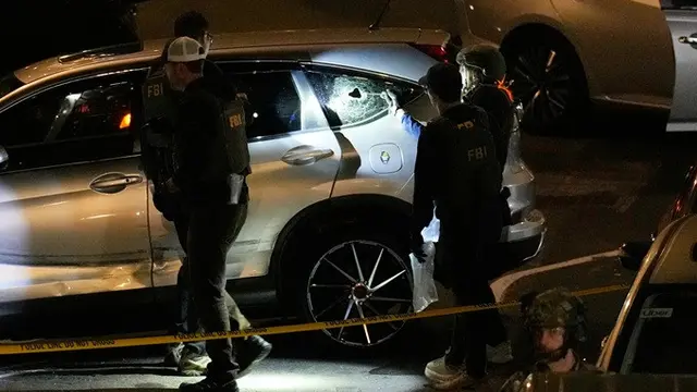 Agen FBI melakukan penyelidikan di lokasi penembakan di New York, Amerika Serikat, Kamis (8/10/2026).