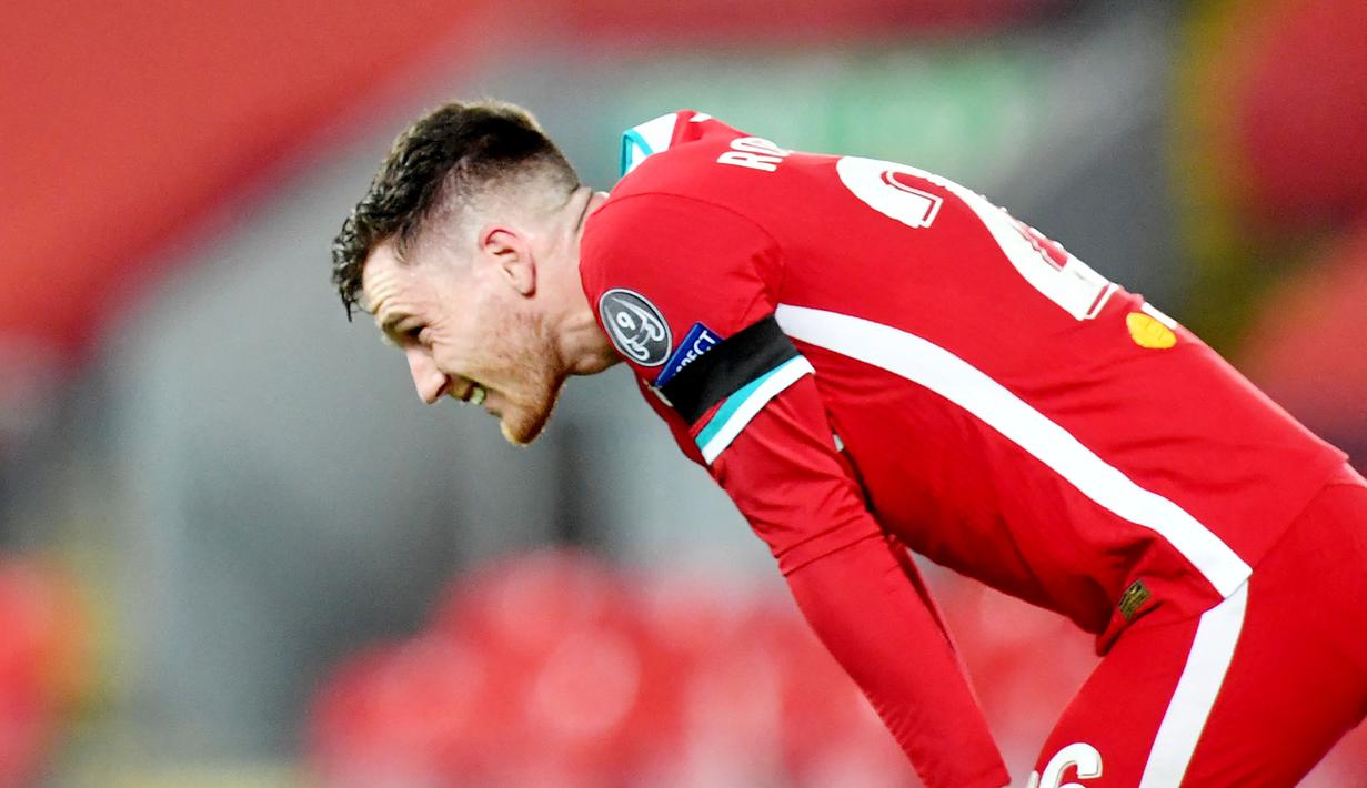 Andrew Robertson - Liverpool lagi-lagi  harus berurusan dengan masalah cedera pemain. Kali ini bek andalannya, Robertson, mengalami cedera engkel saat menjalani laga uji coba melawan Athletic Bilbao. (Foto: AFP/Paul Ellis)