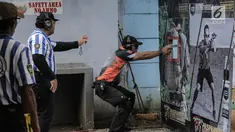 Warga sipil mengikuti kejuaraan menembak Paspampres Shooting Championship 2018 di Jakarta, Jumat (9/2). Kejuaran tersebut memperingati Hari Bhakti ke-72, Pasukan Pengamanan Presiden (Paspampres). (Liputan6.com/Faizal Fanani)