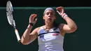 Petenis Prancis, Marion Bartoli merebut gelar Wimbledon pada 2013 setelah mengalahkan petenis Jerman, Sabine Lisicki dengan skor 6-1, 6-4. (AFP/Carl Court)