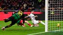 Bermain kandang, AC Milan tertinggal lebih dulu. Tim tamu Lazio berhasil membuka keunggulan lewat gol yang dicetak Mattia Zaccagni pada menit ke-28. (Piero CRUCIATTI/AFP)