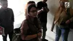 Susi Ferawati memenuhi panggilan polisi terkait viral video dia dan anaknya diduga menjadi korban persekusi di car free day.