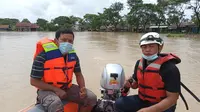 Jebolnya tanggul Sungai Citarum menyebabkan banjir di Kabupaten Bekasi dan Karawang, Minggu (21/2/2021). (dok BNPB)