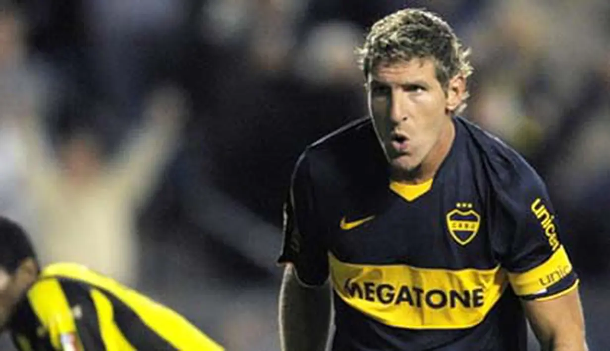Aksi striker Boca Juniors, Martin Palermo seusai mencetak go ke gawang Deportivo Tachira (Venezuela) di laga Libertadores Cup Grup 2 yang digelar di La Bombonera Stadium, Buenos Aires, 30 April 2009. AFP PHOTO/Juan Mabromata 