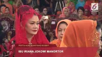 Intip penampilan kompak Ibu Iriana Jokowi dan Ibu Hanifah Siregar di pesta adat Kahiyang Ayu dan Bobby Nasution. (Liputan6/ Dokumen istimewa)