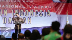 Presiden Joko Widodo memberikan kata sambutan dalam Musyawarah Nasional IV Adkasi di Jakarta, Kamis (17/12). Musyawarah nasional ini bertema 'Membangun Indonesia Dari Daerah' dengan dihadiri DPRD Kabupaten seluruh Indonesia. (Liputan6.com/Faisal R Syam)