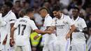 Gelandang Real Madrid, Marco Asensio (kedua kanann) berselebrasi dengan rekan setimnya setelah mencetak gol ke gawang Getafe pada pertandingan lanjutan La Liga Spanyol di stadion Santiago Bernabeu di Madrid, Spanyol, Minggu, 14 Mei 2023. (AP Photo/Manu Fernandez)