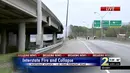Petugas damkar berusaha memadamkan api yang menyebabkan jembatan layang di jalur Interstate 85 di Atlanta, Negara Bagian Georgia, Amerika Serikat (AS) runtuh, Kamis (30/3). Jembatan layang itu dikenal sebagai jalur tersibuk di Amerika. (WSB-TV via AP)